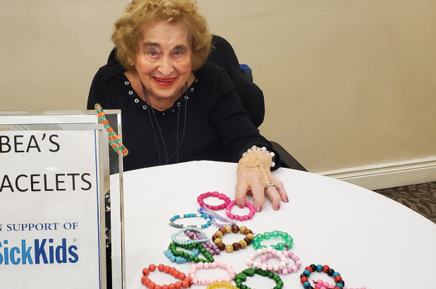 Beatryce: Senior woman selling handmade bracelets to fundraise for charity